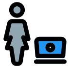 Businesswoman working online on a laptop computer icon