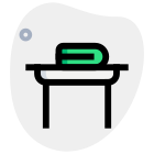 Book piling up on a library desk icon