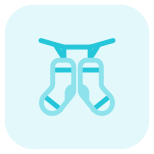 Drying the socks on a string with the help of clips icon