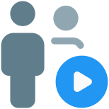Family playing video on a player shared on a messenger icon