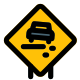 Slippery road with a warning on a road traffic signal icon