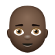 Bald Man Dark Skin Tone icon